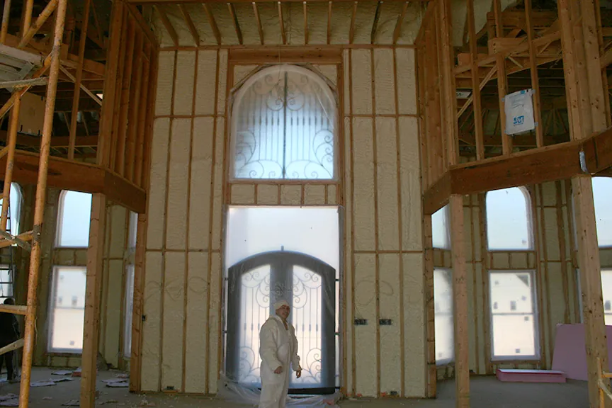 Insulation being installed in large home
